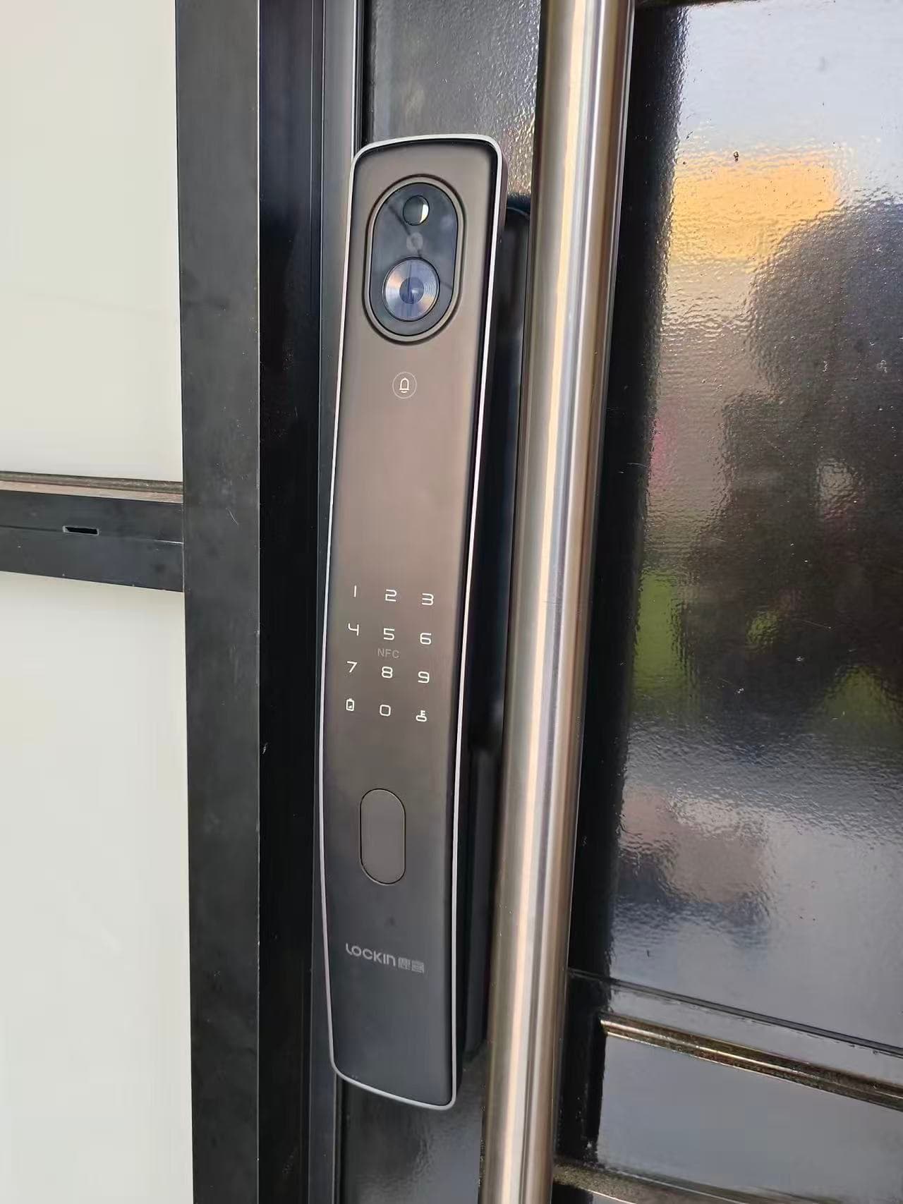 Close-up of Lockin smart lock keypad and camera after installation