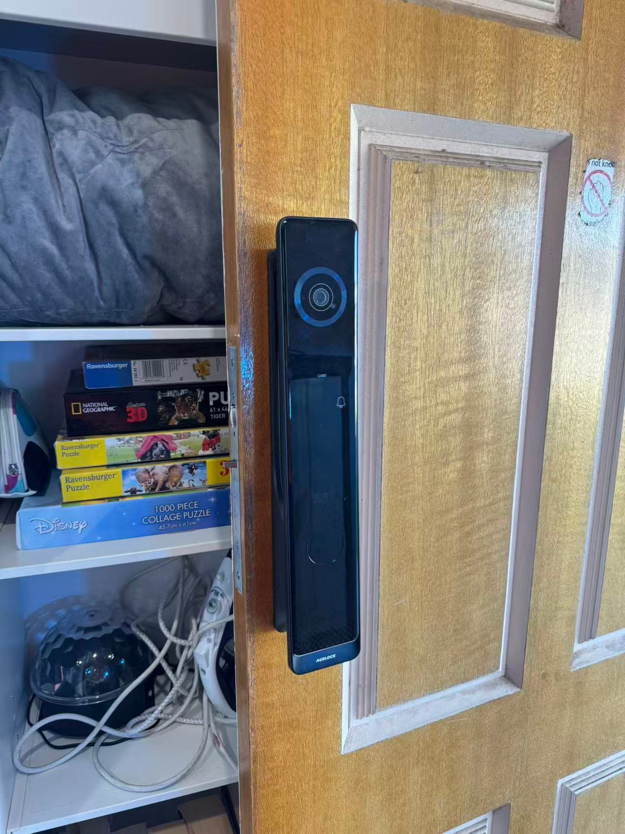 AUSLOCK smart lock installed on an opened Adelaide door